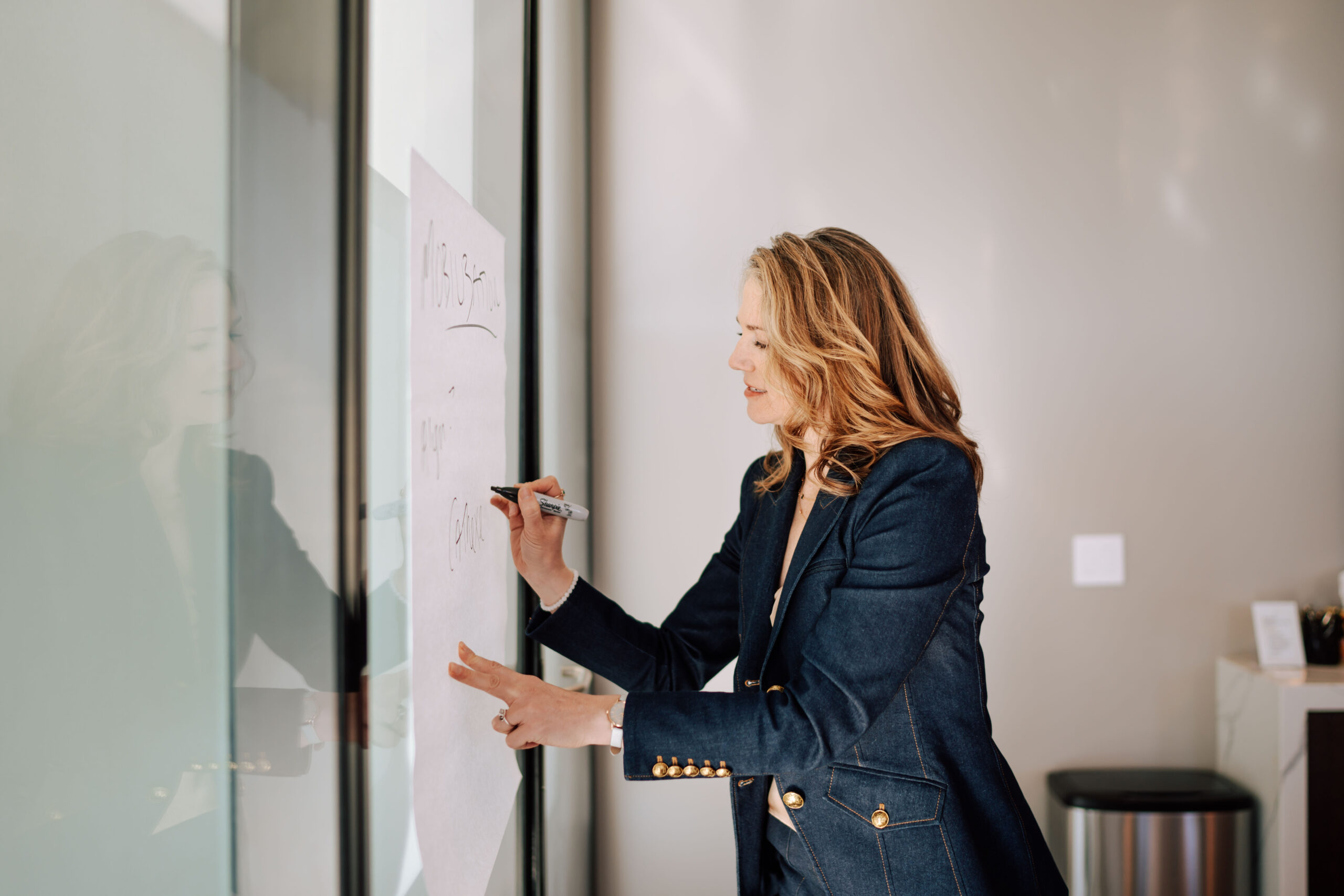 Kari Zeller at the whiteboard